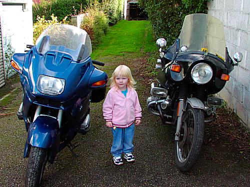 Natalies daughter with her dads motorcycles